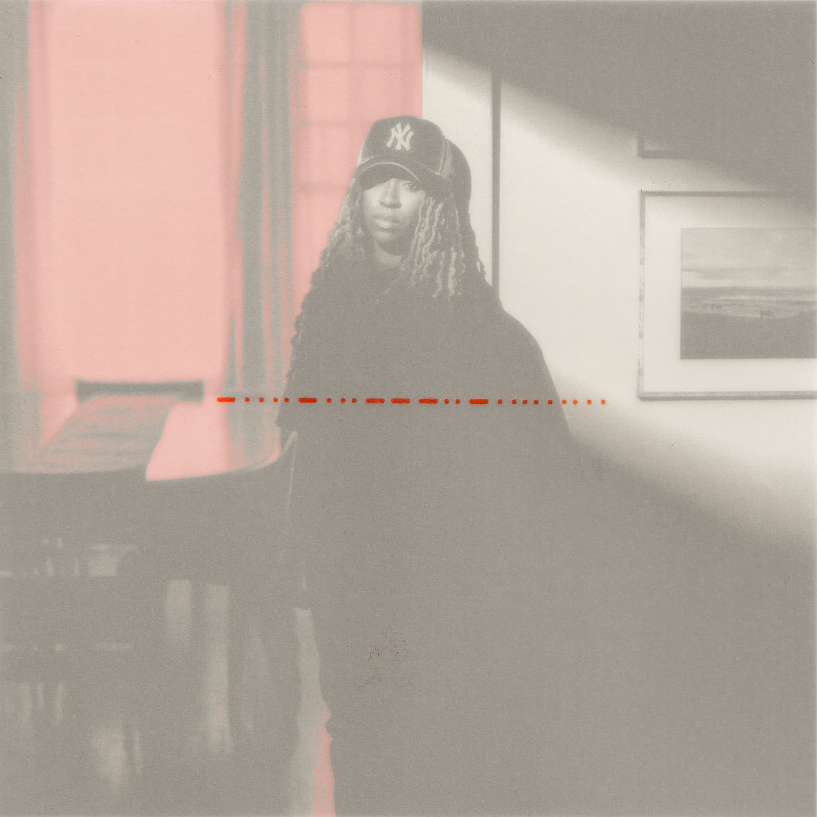 A collage: a red house mark on paper, Jackie Hill Perry's hands, a red field